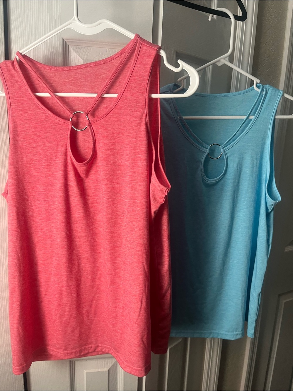 Women’s bundle of 2 flowy peep-hole tank tops size Large